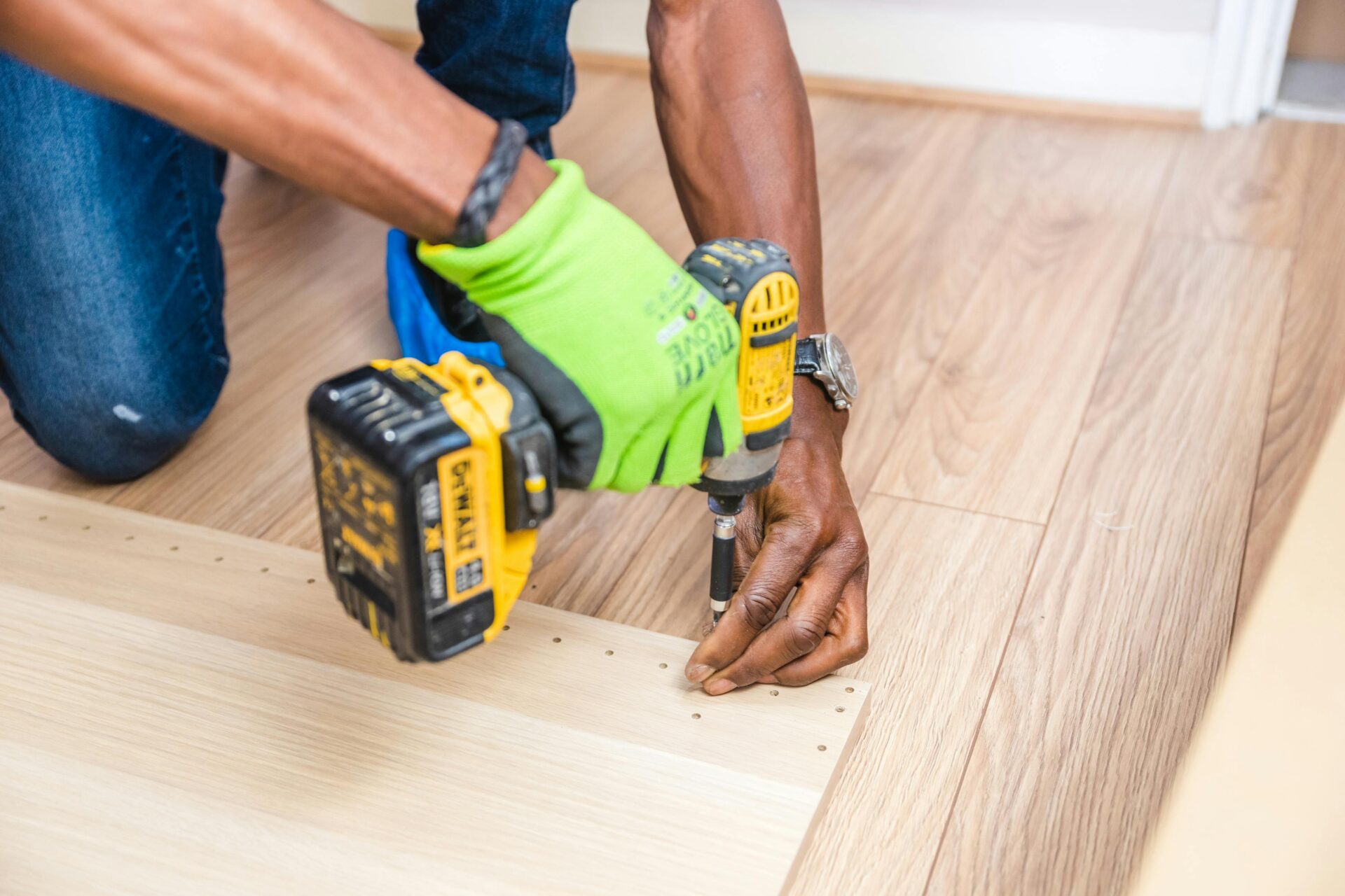 Homeowner discussing flooring plans with contractor in Omaha