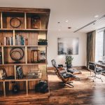 Inviting home library with hardwood flooring